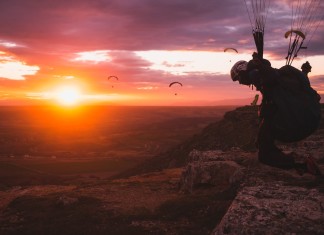 Paragliding at sunset in La Muela (Spain)